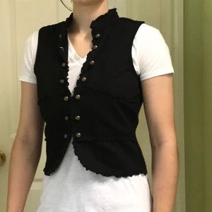 Black vest with golden buttons